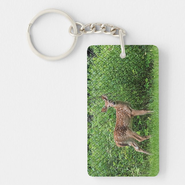 Fawn in front of a fence keychain (Front)