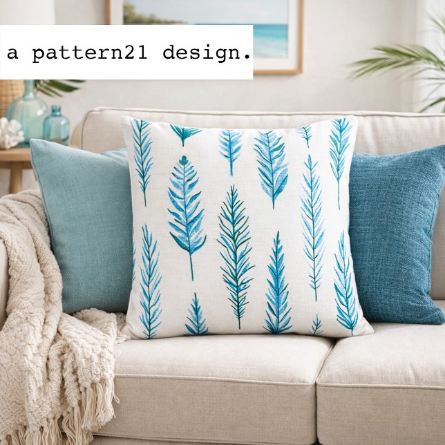 feather and fern blues pattern throw pillow (Watercolor fern pillow adds fresh blue botanical pattern to relaxed coastal interiors)