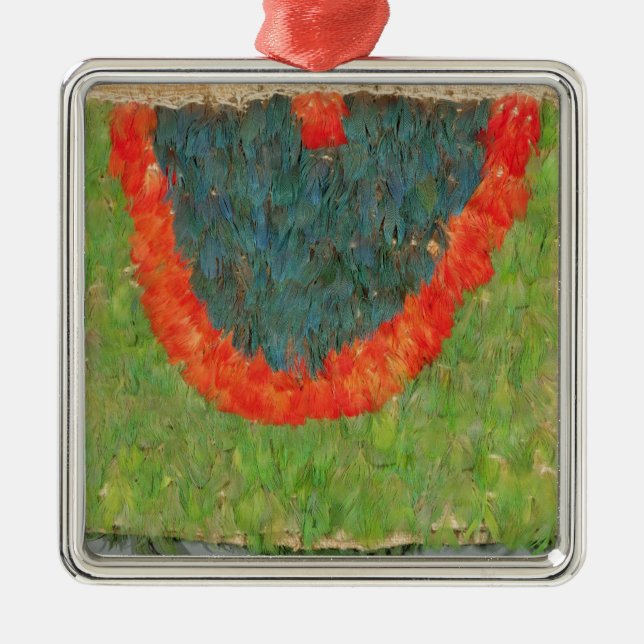 Feathered cape metal ornament (Front)