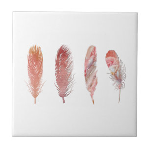 Feathers in pink and coral on a white backdrop tile
