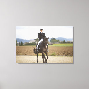 female dressage rider exercising canvas print