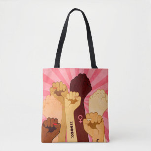 Female hands with fist raised up tote bag