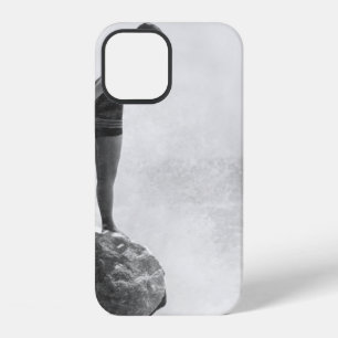 Female swimmer on rock above crashing surfvintage, iPhone 12 case