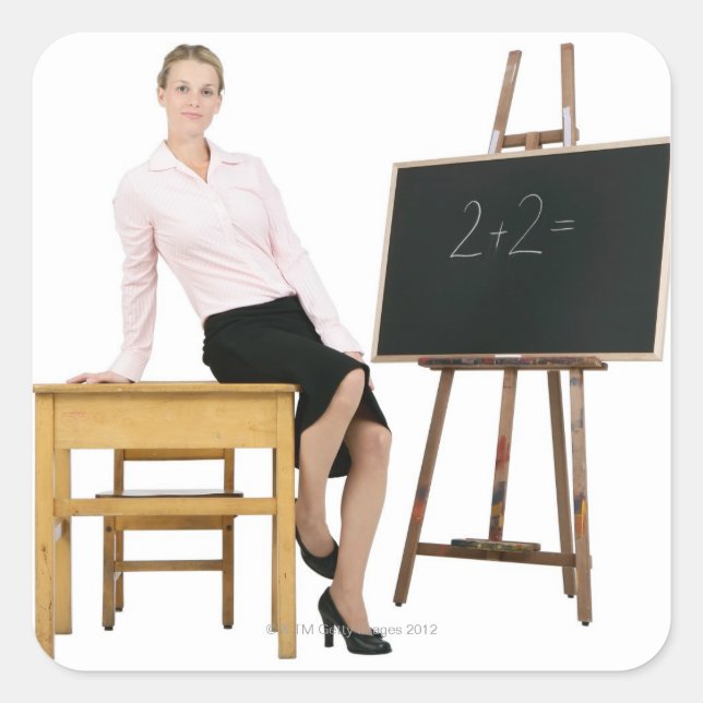 Female Teacher Posing by Wooden Desk Square Sticker (Front)