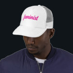 Feminist hot pink text trucker hat<br><div class="desc">A feminist is a person who supports equal rights for all genders.</div>