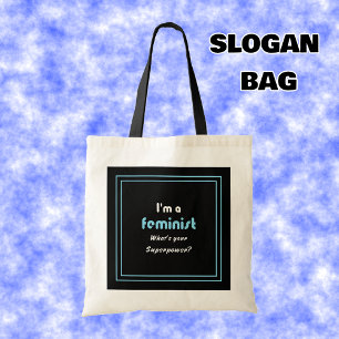 Feminist superpower slogan white on black tote bag
