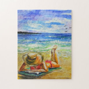 Femme au puzzle de la plage