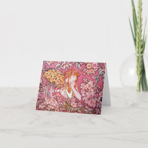 Femme de Mucha parmi des cartes de note de Nouveau