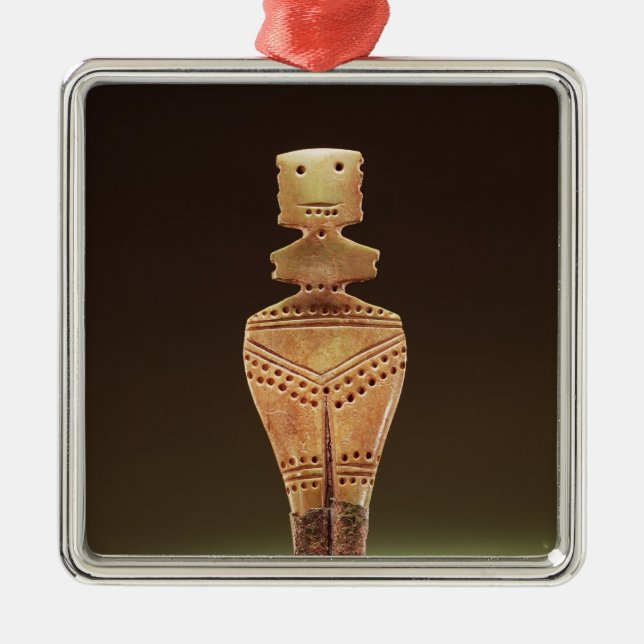 Fertility figure metal ornament (Front)