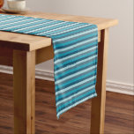 Festive blue stripes pattern Table Runner<br><div class="desc">A festive table runner with a stripe pattern made of blue hues . Prefect for everyday or for the Holidays like Christmas or Hanukkah .
© ArianeC Illustrations-All rights reserved</div>
