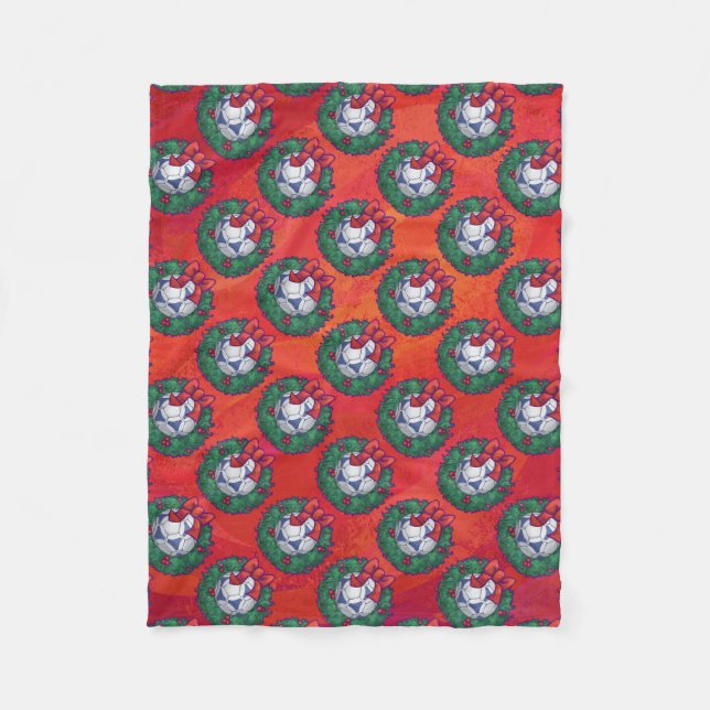 Festive Blue, White Soccer Ball Pattern on Red Fleece Blanket (Front)