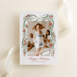 Festive Christmas Ribbon with Poinsettias Foil Holiday Card<br><div class="desc">Send you family and friends a family update and message of holiday cheer with this one-photo Christmas card featuring a trendy, hand-drawn illustration of a forest green ribbon accented with festive sprigs of red poinsettia flowers, greenery and real gold foil metallic berry dots. Traditional fonts keep the design feeling high...</div>