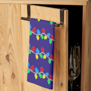Festive Christmas String Lights on Blue Kitchen Towel