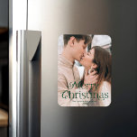 Festive Elegance Green Merry Christmas Photo Magnet<br><div class="desc">Simple holiday magnet featuring your full-bleed vertical photo with "Merry Christmas" displayed in elegant green lettering. Personalize the elegant Christmas photo magnet with your family name and the year.</div>