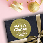 Festive Elegant Golden Embossed Christmas Tree Classic Round Sticker<br><div class="desc">This is a captivating and festive Christmas sticker that adds a touch of personal charm to your holiday greetings. The sticker features a radiant embossed Christmas tree, adorned with vibrant ornaments that sparkle against a golden backdrop. Above the tree, the timeless greeting "Merry Christmas" is elegantly inscribed, adding a classic...</div>