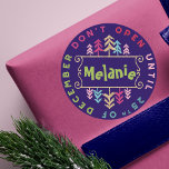 Festive, Fun & Colourful Do Not Open Til Christmas Classic Round Sticker<br><div class="desc">No peeking! safeguard your Christmas presents from your sneaky peekers with our fun, whimsical and colourful "don't open until 25th of December" stickers. The Design features different fun and bold typographic typography to create a fun design. Bright colours of reds, pinks, greens, blues and faux gold accents against a dark...</div>