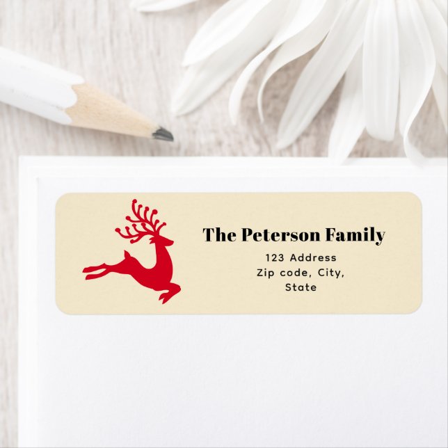 Festive moderne renne rouge sauter sur la crème (En situation)