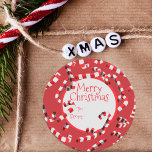 Festive Red and White Candy Canes Christmas Classic Round Sticker<br><div class="desc">Add a touch of festive cheer to your holiday gifts with our customizable Christmas sticker. This round sticker features a vibrant red background adorned with whimsical red and white candy canes with 3D effect, creating a joyful Christmas atmosphere. At the heart of the design is a beautifully written 'Merry Christmas'...</div>