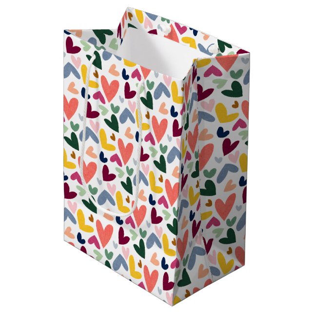 Festive Red Peach Blush Pink Blue Heart Pattern Medium Gift Bag (Front Angled)