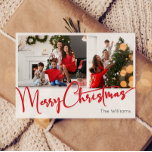 Festive Red Script Merry Christmas Two Photo Holiday Card<br><div class="desc">Celebrate the season with this festive red script Merry Christmas two photo holiday card featuring a touch of elegant charm. The chic design showcases a simple red-and-white colour palette, evoking the cozy spirit of winter. Its modern and unique appeal and rustic wording create a perfect balance between seasonal and contemporary....</div>