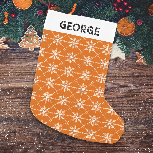 Festive Snowflakes Pattern Burnt Orange Custom Small Christmas Stocking (A personalized Christmas stocking with snowflakes pattern on a burnt orange background)