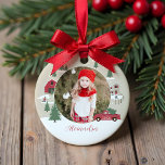 Festive Vintage Christmas Tree Farm Photo Ceramic Ornament<br><div class="desc">Celebrate the magical and festive holiday season with our custom holiday photo ornament. Our vintage holiday design features a Christmas tree farm scenery, this Christmas pattern incorporates a farm Christmas scene featuring a farmhouse, a red barn, children playing and throwing snowballs, Christmas trees, and a red vintage truck. All artwork...</div>