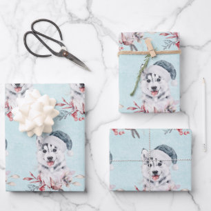 Feuille De Papier Cadeau Chien de Noël Husky dans un chapeau de Père Noël