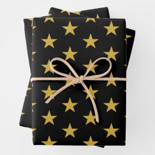 Feuille De Papier Cadeau Étoiles d'or sur noir
