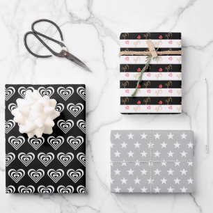 Feuille De Papier Cadeau Étoiles et cœurs sur fond noir et blanc