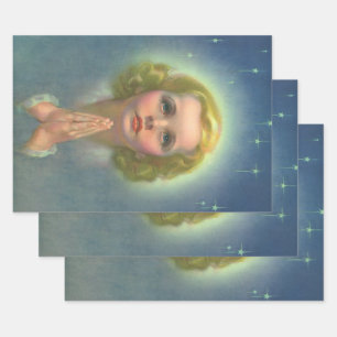 Feuille De Papier Cadeau Fille blonde angélique avec un halo et des étoiles