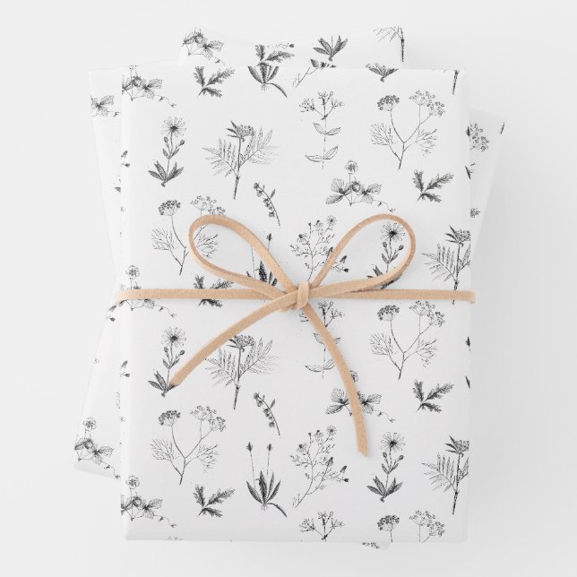 Feuille De Papier Cadeau Herbes noires et blanches Motif Fleur sauvage bota (En situation)