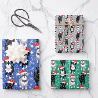 Feuille De Papier Cadeau Les experts de Noël jouent dans la neige