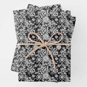 Feuille De Papier Cadeau Motif de dentelle blanche sur fond noir