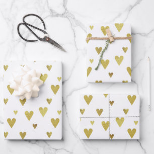 Feuille De Papier Cadeau Multiples Coeurs d'or sur Arrière - plan blanc
