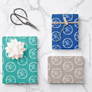 Feuille De Papier Cadeau Noël tropical en juillet coquille de plage de sabl