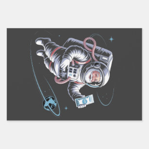 Feuille De Papier Cadeau Père Noël astronaute avec costume spatial Noël fes