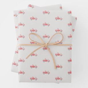 Feuille De Papier Cadeau Père Noël classique sur un camion à feu Noël