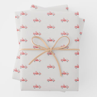 Feuille De Papier Cadeau Père Noël classique sur un camion à feu Noël