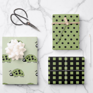 Feuille De Papier Cadeau Poupées et carrés verts et noirs