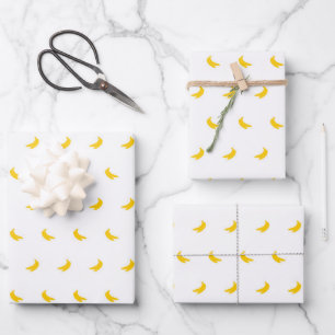 Feuille De Papier Cadeau Silhouettes de petites bananes jaunes sur blanc