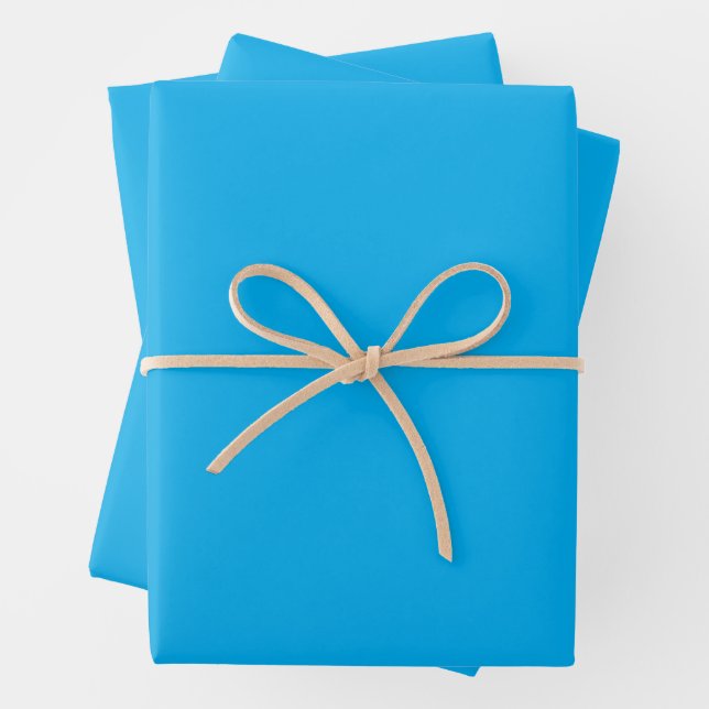 Feuille De Papier Cadeau Solid Cyan Blue Background  (En situation)