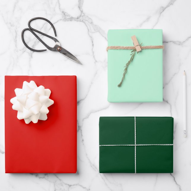 Feuille De Papier Cadeau Solides hiver À feuillage persistant et rouges cre (Recto)