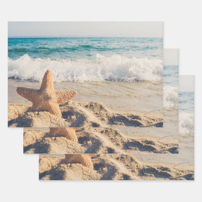 Feuille De Papier Cadeau Starfish sur une plage de sable Photo (Lot)