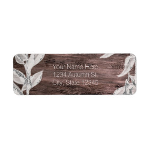 Feuilles blanches et argentées et bois rustique Él