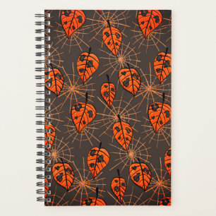 Feuilles d'automne d'Halloween et toiles d'araigné