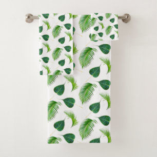 Feuilles de palmier vertes sur fond blanc