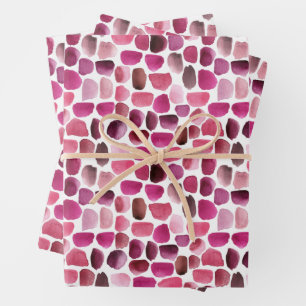 Feuilles de papier cadeau aux coups de pinceau ros