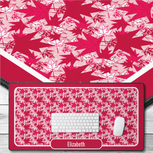Feuilles d'érable sur fond rose