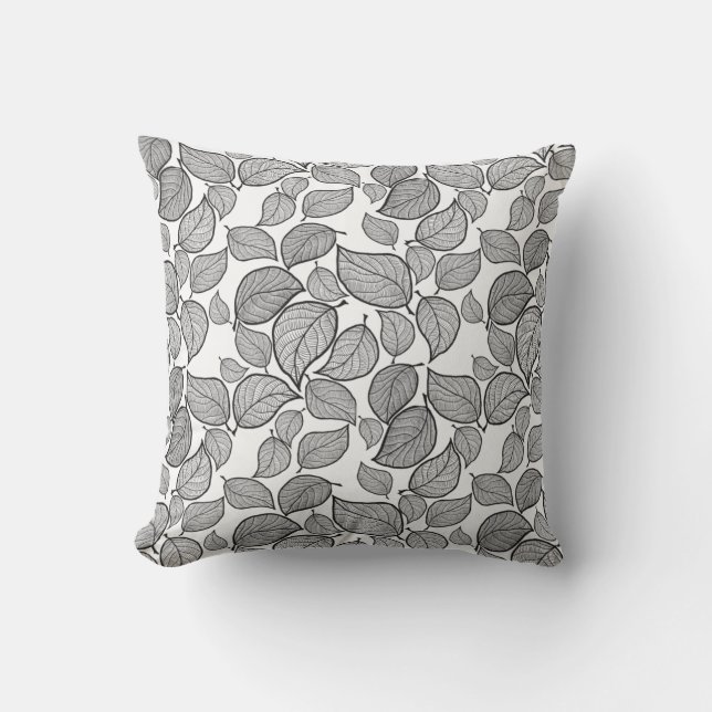 Feuilles noirs sur oreiller blanc (Recto)