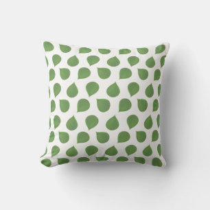 Feuilles vertes d'arbre de jade sur un coussin jet